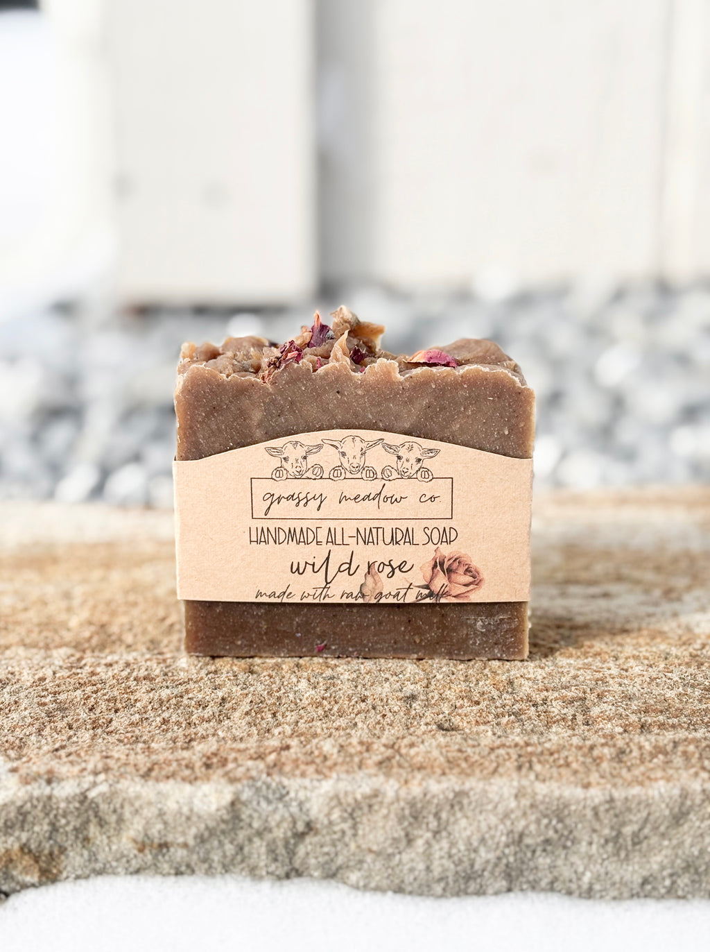 Handmade all-natural Wild Rose bar soap made with raw goat milk.