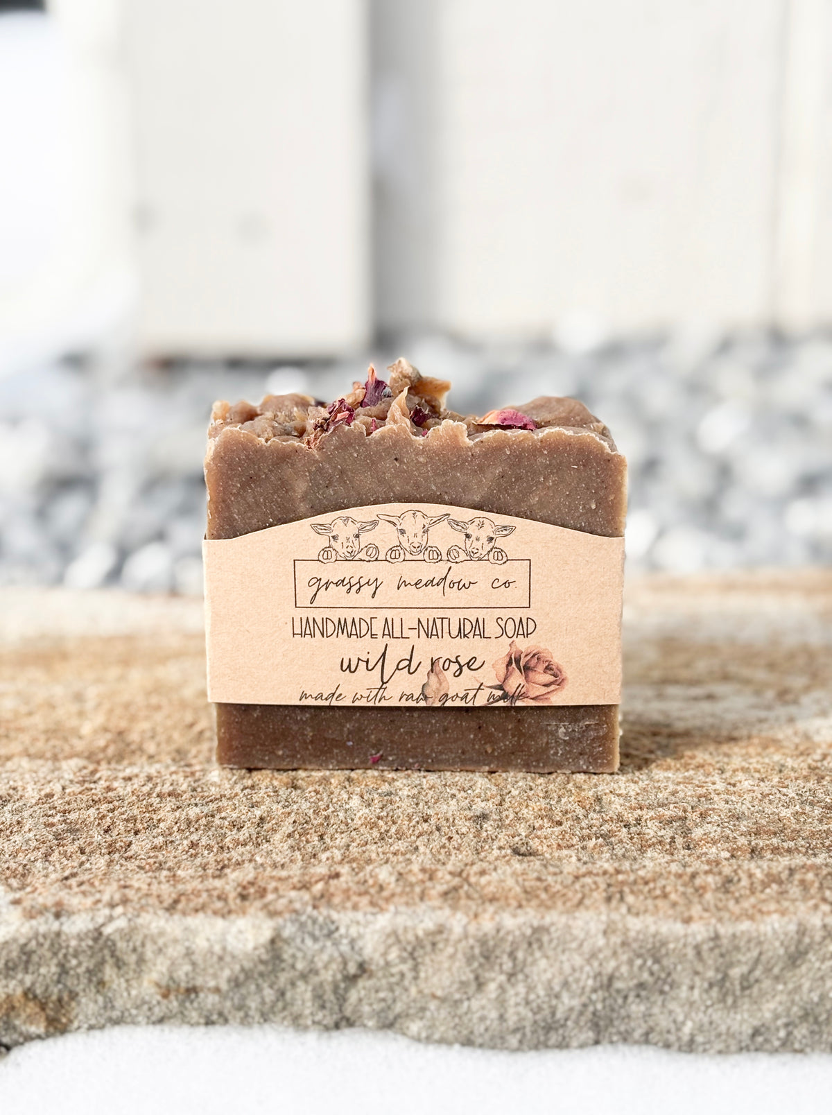Handmade all-natural Wild Rose bar soap made with raw goat milk.
